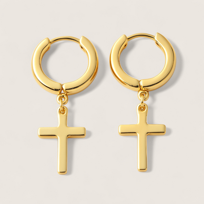 The Creed - Cross Dangle Huggies Earrings-Forge bold style with the Creed Cross Huggies. Polished steel small hoops with dangling cross pendants. Available in steel or gold. Shop now.