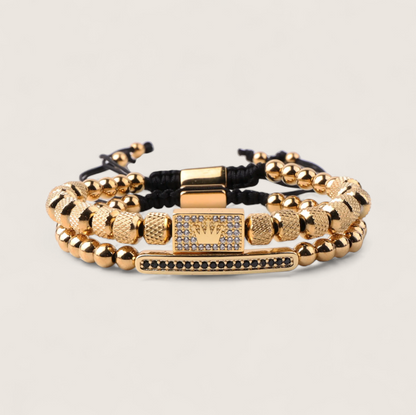 The Crowned Pair- Steel Double Bracelet-Forge your style with the Crowned Pair Bracelet. Dual-strand design with pavé CZ bar and crowned enamel bead. Adjustable black pull-cords. Shop now.