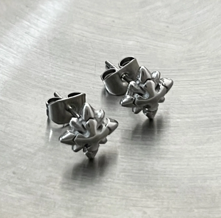 Starbreaker Studs – 8mm Edgy Star Steel Earrings-Channel supernova energy with Micro-Star Studs. CNC-milled steel stars catch light like electric sparks. Bold, scratch-resistant style. Shop now.