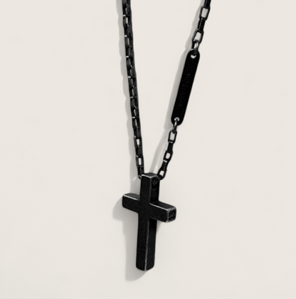 The Crucible Cross Necklace-Temper your look with the Crucible Cross Necklace. Black titanium-plated steel cross on bold 28" box chain. Industrial elegance with Voltage edge. Shop now.