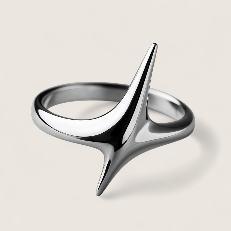 Ion Blade Ring - Offset Spikes Steel Ring-Cut through the static with the Ion Blade Ring. Polished steel, aerodynamic spike design channels bold, futuristic Voltage energy. Shop now.