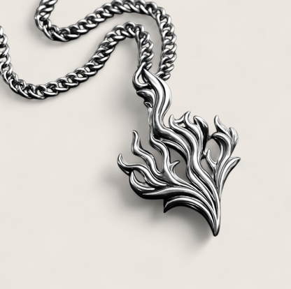 The Hearthfire Pendant – Steel Flame Necklace-Channel forge energy with the Hearthfire Pendant. Sculpted flame in polished steel on an adjustable 24" curb chain. Bold and transformative. Shop now.
