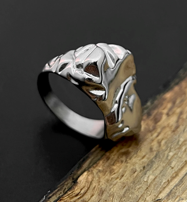 The Livewire – Polished Steel Statement Ring-Channel raw energy with the Livewire Ring. Polished steel, bold 10mm wave-inspired form captures the surge of an electric current. Shop now.