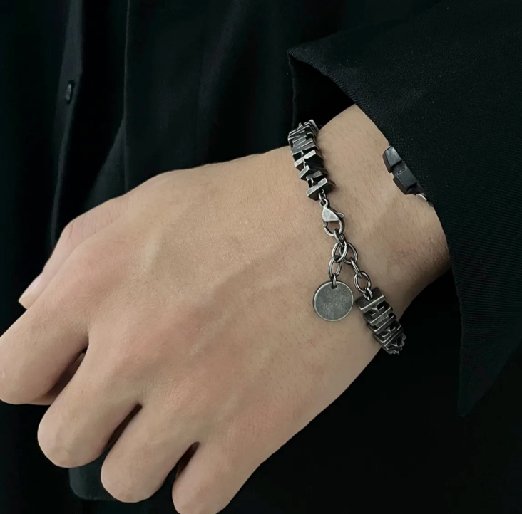 The Relic – Antique-Geometric Steel Bracelet-Channel industrial heritage with the Relic Bracelet. Aged steel segments with antique patina evoke rugged refinement and bygone craftsmanship. Shop now.
