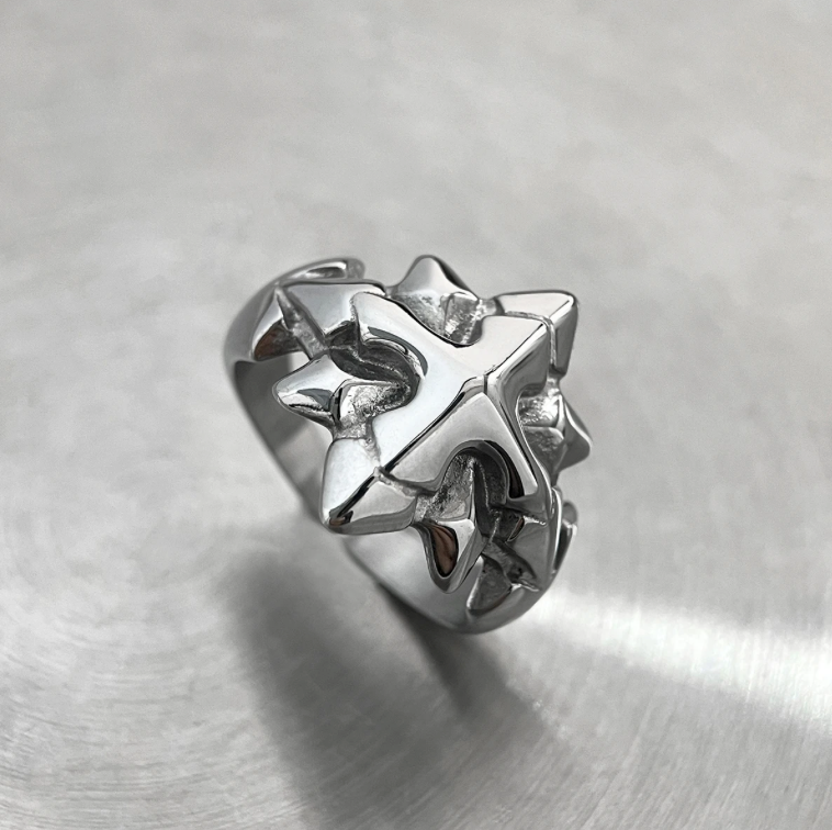 Starbreaker Ring - Statement Star Steel Ring-Channel raw cosmic energy with the Starbreaker Ring. Polished steel, jagged, fragmented design—bold symbol of power and conquest. Shop now.