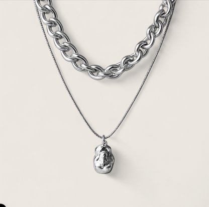 Molten Arc Duo Necklace-Fuel your look with layered steel chains and molten nugget pendant. Bold Voltage style with adjustable curb and snake chains. Shop now.