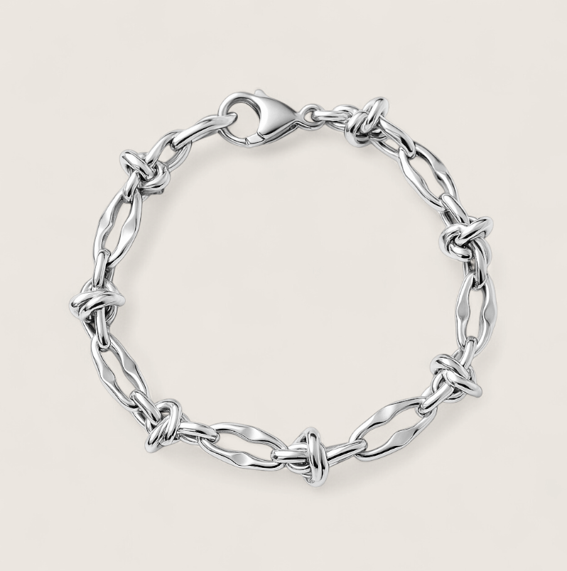 Flux Knot Bracelet-Chaos with control—Flux Knot Bracelet. Polished steel links and knotted elements flow with bold, kinetic style. Lightweight Voltage energy. Shop now.