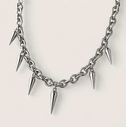 Pulse Spike Necklace-Shock the system with the Pulse Spike Necklace. Polished chain with sharp steel spikes—bold Voltage energy for solo wear or layered looks. Shop now.