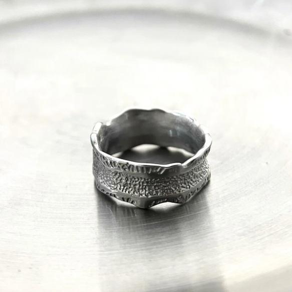Bolt Rift - Textured Concaved Ring-Channel storm energy with the Bolt Rift Ring. 8mm steel band with oxidized lightning-texture and polished edges. Bold Voltage style. Shop now.