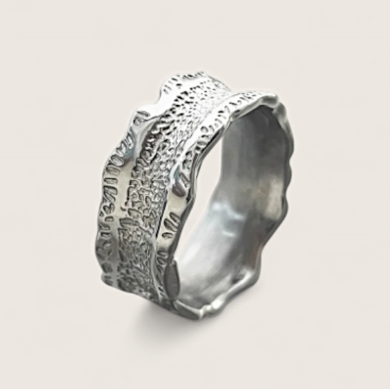 Bolt Rift - Textured Concaved Ring-Channel storm energy with the Bolt Rift Ring. 8mm steel band with oxidized lightning-texture and polished edges. Bold Voltage style. Shop now.