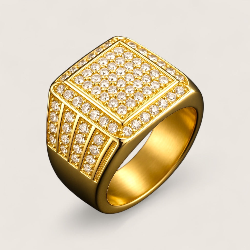 The Sovereign – 18 mm Iced Signet Ring-Elevate your look with the Sovereign Signet Ring. 18mm steel top pavé-set with CZ stones. Polished silver or gold finish. Bold, brilliant style. Shop now.