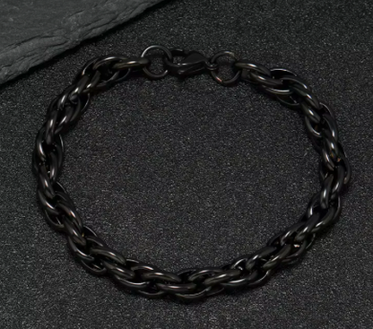 The Vanguard – Cuban Rope Chain Bracelet-A bold twist on the Cuban classic—7mm rope-style links offer texture and presence without bulk. Low-gloss finish commands attention. Shop now.