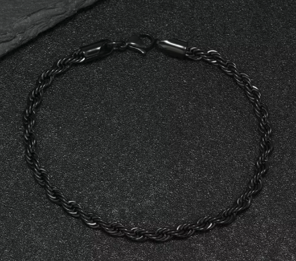 The Obsidian – 4 mm Rope Chain Bracelet-Slim 4mm black rope bracelet with fluid, woven texture. Matte black finish for stealthy, modern style. Perfect solo or layered. Shop now.