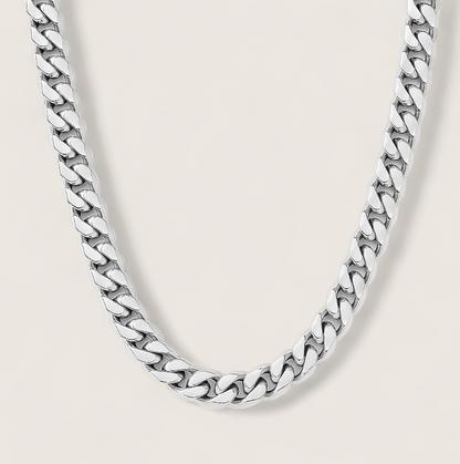 The Argent Curb – 6.7mm Sterling Silver Chain-6.7mm solid sterling silver curb chain. Polished flat links crafted in Italy for bold, versatile style. Wear solo or layered. Shop now.