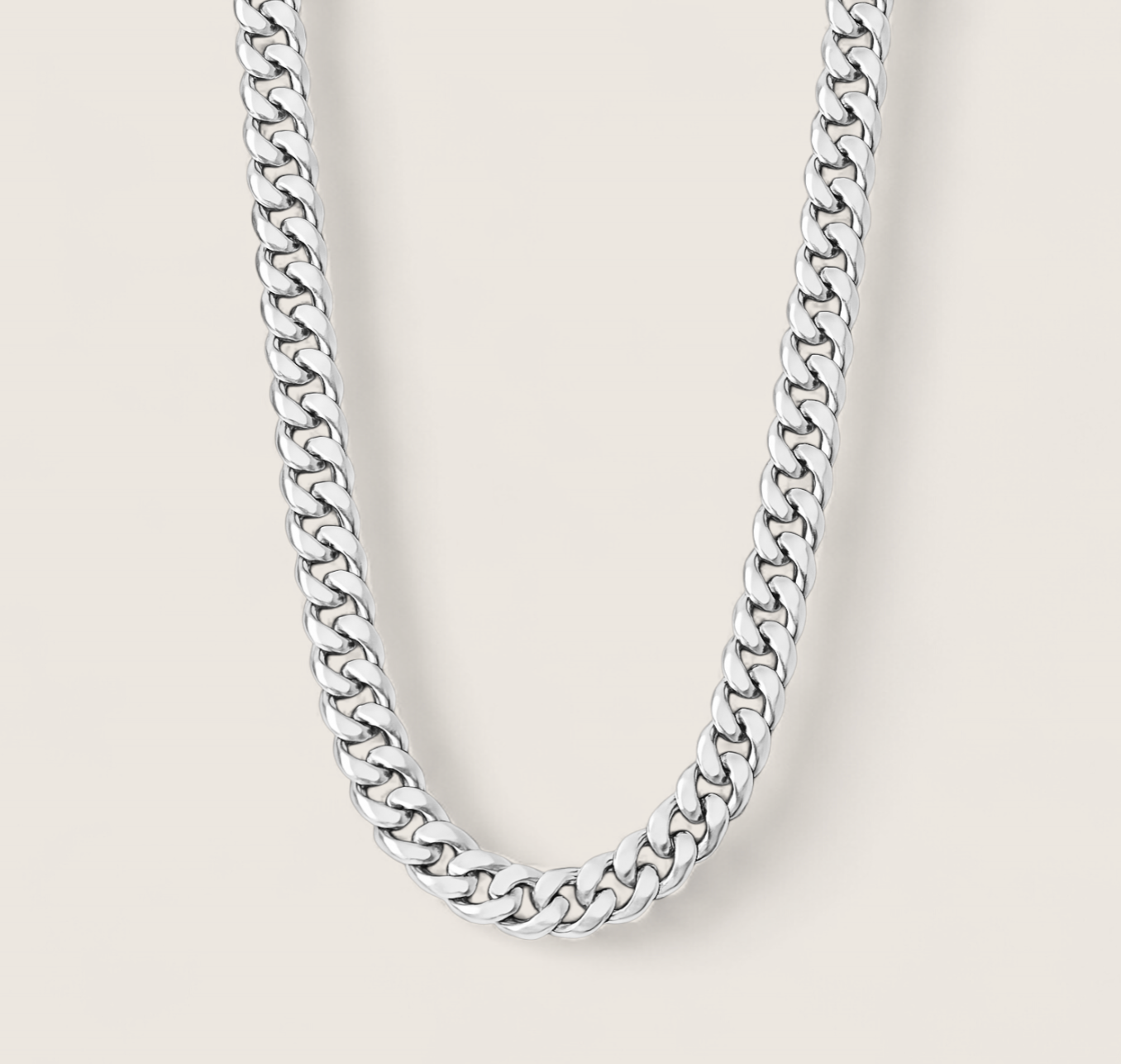 The Argent Curb – 5.8mm Sterling Silver Chain-5.8mm solid sterling silver curb chain. Polished flat links, crafted in Italy. Clean, bold silhouette—perfect solo or layered. Shop now.