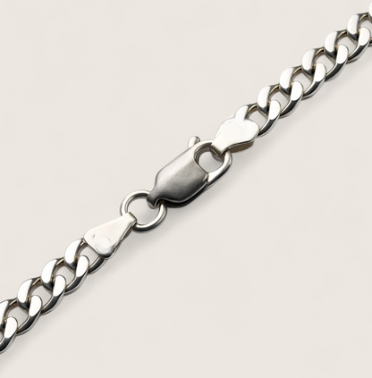 The Argent Curb – 3mm Sterling Silver Chain-3mm solid sterling silver curb chain. Polished flat links, crafted in Italy. Sleek and versatile—wear solo or layered. Shop now.