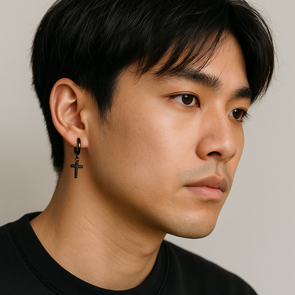 The Creed - Cross Dangle Huggies Earrings-Forge bold style with the Creed Cross Huggies. Polished steel small hoops with dangling cross pendants. Available in steel or gold. Shop now.