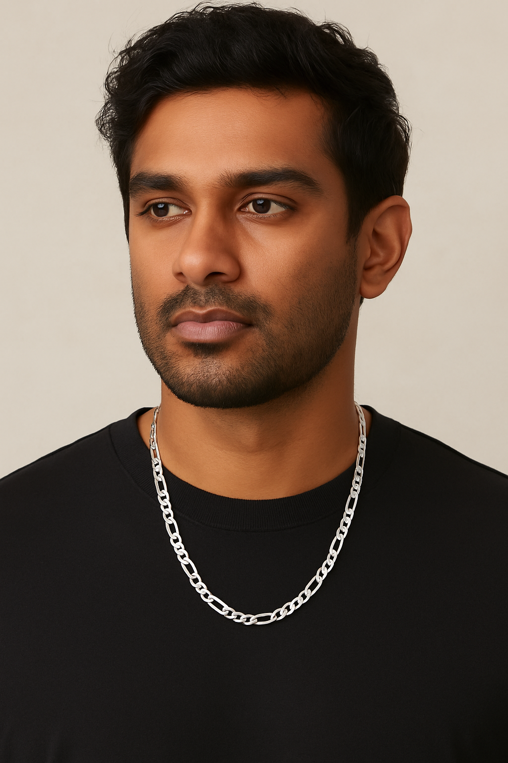 The Argent Figaro – 5.7mm Sterling Silver Chain-Bold 5.7mm sterling silver Figaro chain, diamond-cut for texture and shine. Crafted in Italy. A timeless statement piece. Shop now.