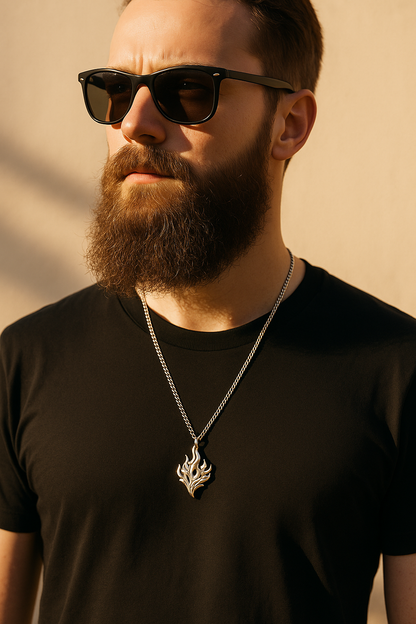 The Hearthfire Pendant – Steel Flame Necklace-Channel forge energy with the Hearthfire Pendant. Sculpted flame in polished steel on an adjustable 24" curb chain. Bold and transformative. Shop now.