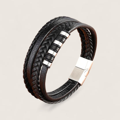 The IronPattern – Leather & Steel Bracelet-Triple-layer leather with a bold steel centerpiece. Rugged texture meets modern precision. Forge your look.