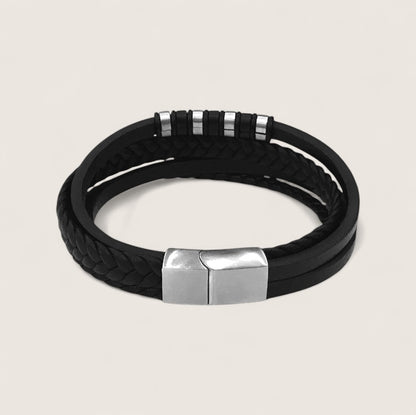 The IronPattern – Leather & Steel Bracelet-Triple-layer leather with a bold steel centerpiece. Rugged texture meets modern precision. Forge your look.