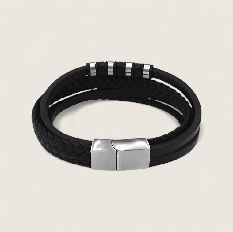 The IronPattern – Leather & Steel Bracelet-Triple-layer leather with a bold steel centerpiece. Rugged texture meets modern precision. Forge your look.