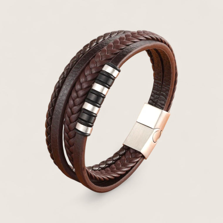 The IronPattern – Leather & Steel Bracelet-Triple-layer leather with a bold steel centerpiece. Rugged texture meets modern precision. Forge your look.