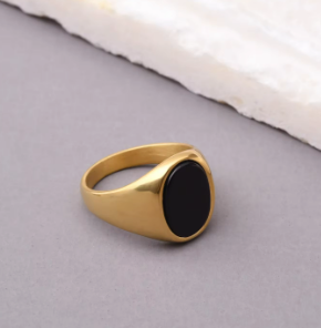 The Zenith – Oval Stone Signet Ring-Reach your peak with the Zenith Signet Ring. Polished steel or 18K gold with a recessed oval stone—Black Agate, White Agate, or Tiger Eye. Shop now.