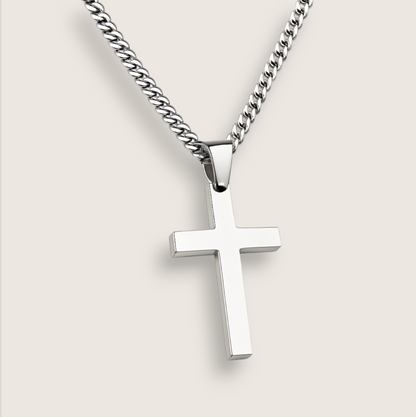 The Guardian – Cross Necklace-Discover the Men’s Smooth Cross Necklace: mirror-polished stainless steel (20 × 35 mm) on a 24″ chain. Tarnish-resistant shine—shop at Anvil&Ore.
