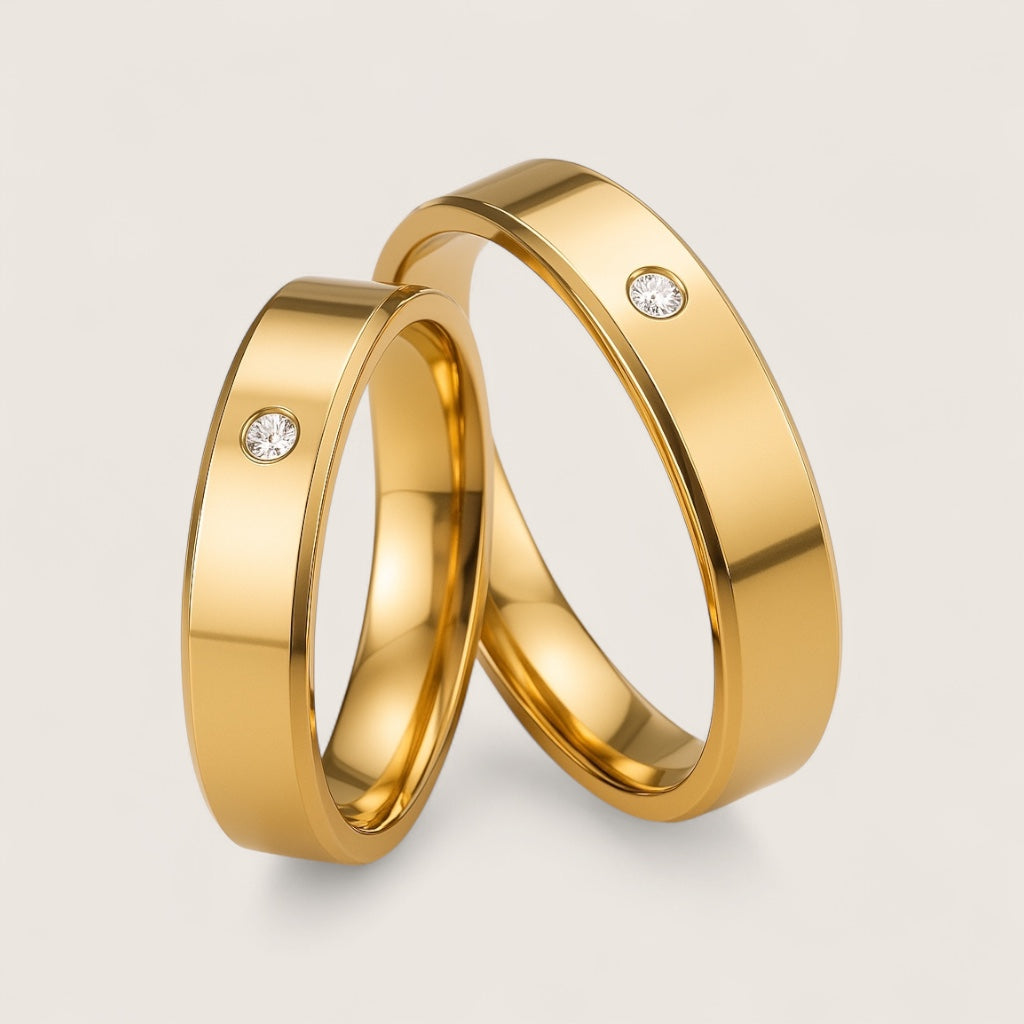The Solis Solitaire – Flat Stainless Steel Ring-Discover The Solis Solitaire: a sleek 4 mm or 6 mm flat stainless steel ring in silver or gold finish, featuring a bezel-set CZ for refined minimalism. Shop Now