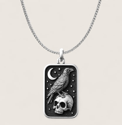Transform and Live Necklace-Embrace transformation with this symbolic talisman—raven, skull, and crescent moon in bold relief. Part of Anvil&Ore’s limited Talisman Collection.